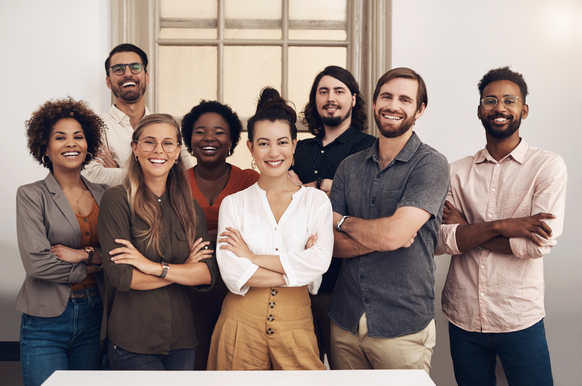 Vielfältiges COPPEN Team lächelt in die Kamera